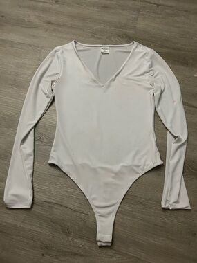 No Boundaries Long Sleeve V‑Neck Bodysuit in White